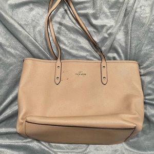 Used beige Coach purse